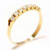 Meia aliança de brilhantes em ouro amarelo 18k Meia aliança de brilhantes em ouro amarelo 18k
